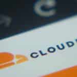 Close-up of a screen showing the Mastercard logo and the word CLOUD on a cloud services page, slightly blurred.